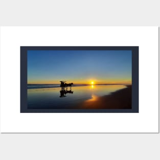 A silhouetted horse-drawn carriage on Parangtritis beach at sunset 2 Posters and Art